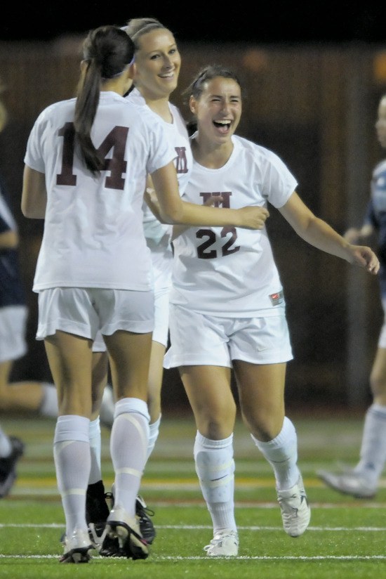 Islanders Celina Solomon (22) celebrates a goal against Interlake at Mercer Island on Tuesday