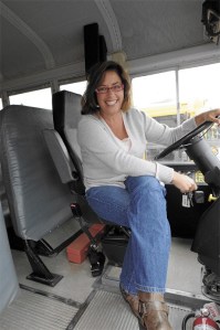 Islander Megan Hand is shown at the wheel of a school bus as part of a portfolio of women who are featured in an on-line photo album produced by celebrity photographer Annie Leibovitz.