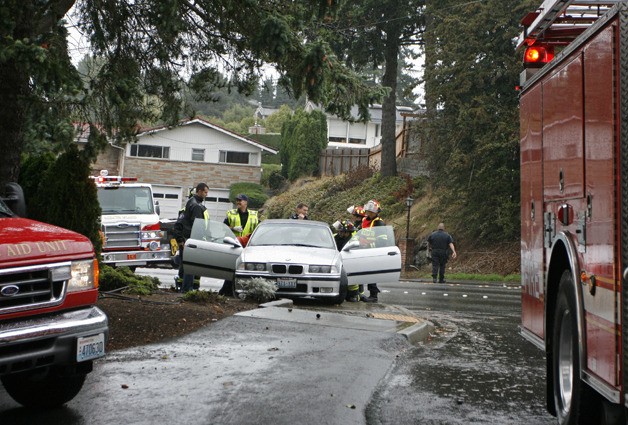 Mercer Island Police and Fire respond to a car accident that took place on the morning of Sept. 23. A BMW was rear-ended by a Chrysler.