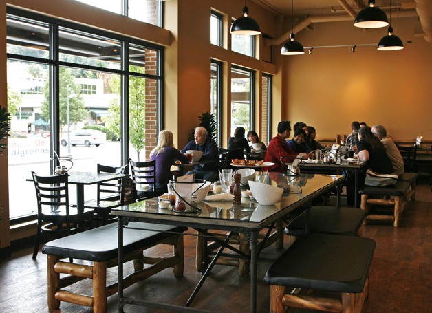 Patrons enjoy the new pizzeria on the Island at Mo’s Pizza and Wine Dive.