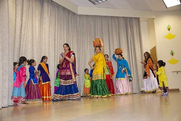 Women perform a dance at Saturday's Diwali festival at MI Presbyterian Church.
