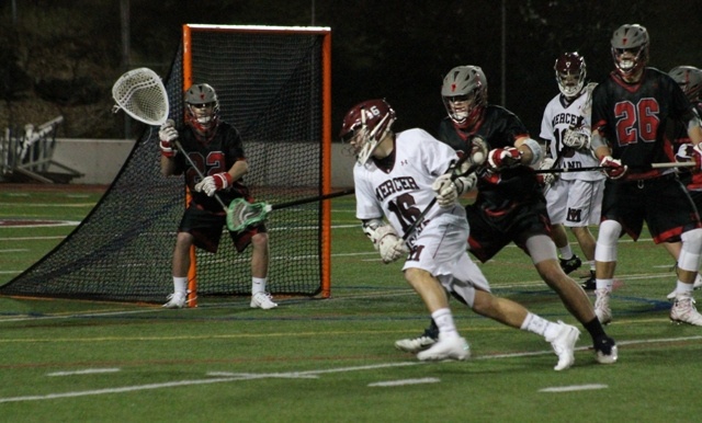 Mercer Island's Brett Bottomley (16) prepares to shoot against Seattle Academy Friday night at Islander Stadium. The Islanders beat the Cardinals