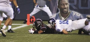 A Mercer Island player goes down with the football just short of the goal line during the Islanders overtime loss to Seattle Prep last Saturday at Century Link Field.
