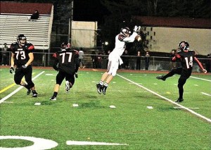 Islander Patrick Nielson blocks a punt