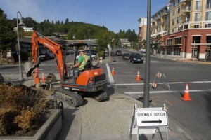 Construction at the intersection of 77th Avenue SE and SE 27th Street in the downtown business district of Mercer Island on Thursday