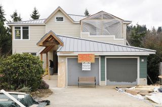 Chad Coleman/Mercer Island Reporter A home is being renovated on 80th Avenue S.E. on Mercer Island