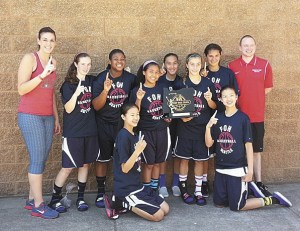 Mercer Island student Claire Mansfield is a member of the Friends of Hoop Blue basketball team which won the End of Trail tournament in Oregon.