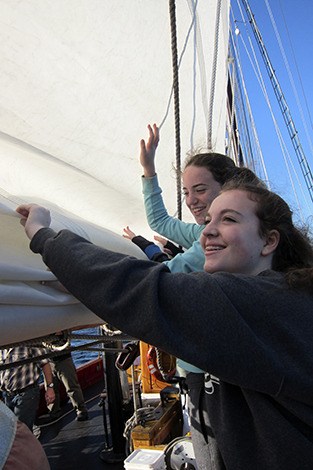 Lilliana and Dalia man the sales on the 100-year-old schooner.