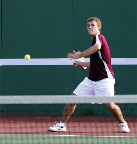 Matt Sedlacek prepares to return a serve during the Islander tennis team’s home win over Juanita last week.