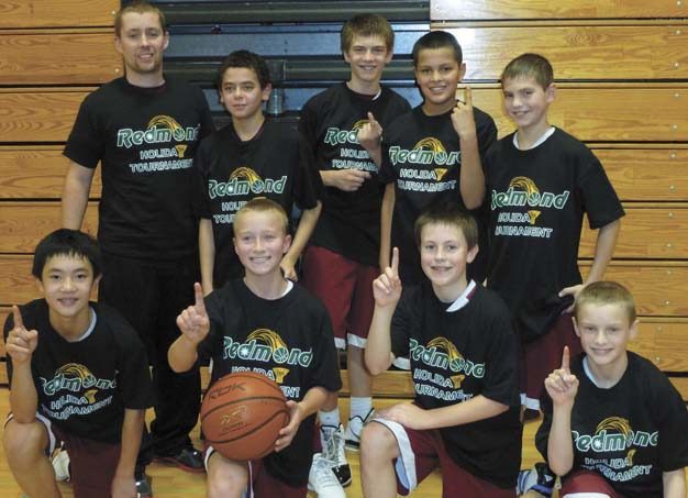 The Mercer Island sixth grade select ETL basketball team won the Redmond Select basketball Holiday Tournament in mid-December.