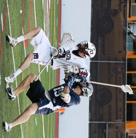 Mercer Island's Mikey Schwartz holds off Bellarmine's Zach Fuller during the Islanders state quarterfinal game on Friday night. Mercer Island won 11-5.