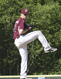 Will Mansfield winds up to deliver the pitch against Bellevue.