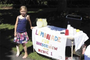 Mercer Islander Lily James braved the heat last weekend to sell lemonade to raise money for Harborview Medical Center and Medic 1. She raised $200.