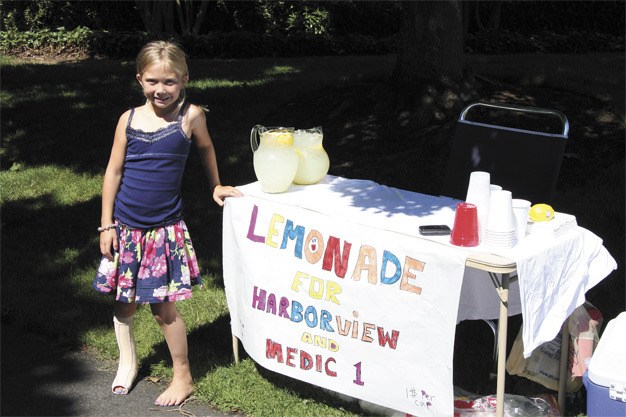 Mercer Islander Lily James braved the heat last weekend to sell lemonade to raise money for Harborview Medical Center and Medic 1. She raised $200.