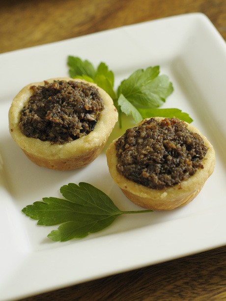 Mushroom tarts are another crowd-pleaser to try this holiday season when preparing menus for parties and family events.