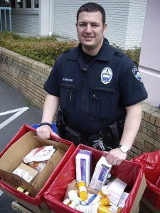 The Mercer Island Police Department collected nearly 140 pounds of unused medication during the second annual Drug Take Back event. A small assortment is shown with Detective Chad Schumacher on Saturday