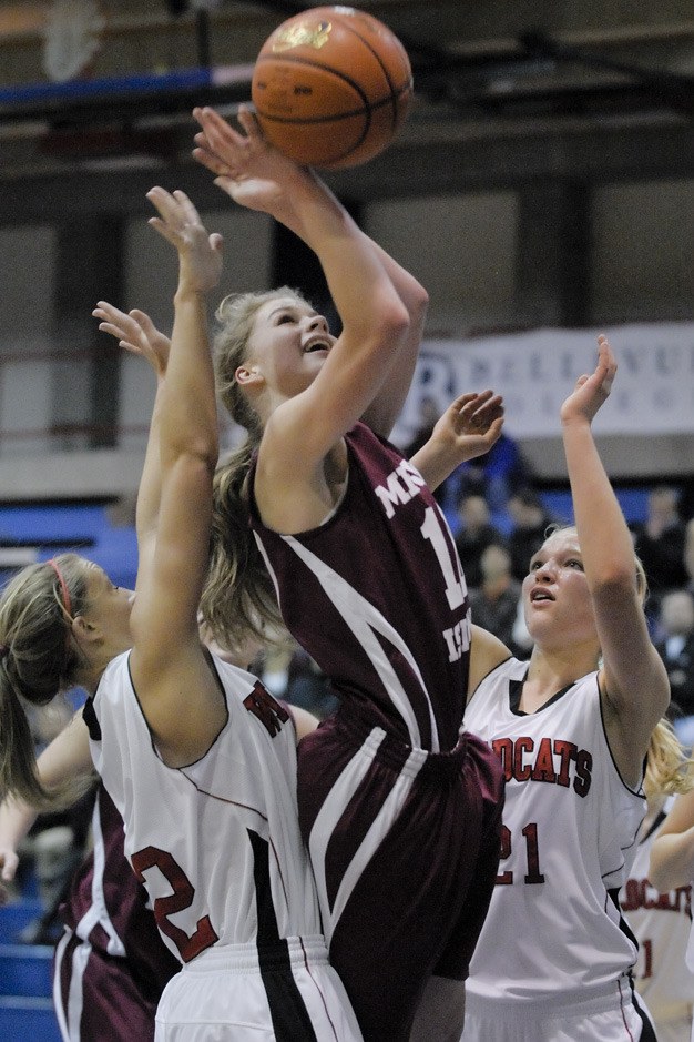 Kris Brackmann rebounds the ball during the Islanders’ loss to Mount Si in the KingCo tournament last week.