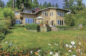 This waterfront home at 4610 E. Mercer Way has been on the market for over 450 days. The home features 69 feet of low-bank frontage