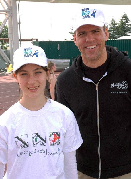Jacqueline Bendrick and former Olympic athlete Gary Hall Jr. during this year’s Beat the Bridge event.