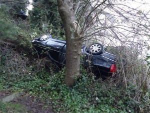 A Metropolitan Town Car limousine rolled over in the 7700 block of West Mercer Way on Sunday