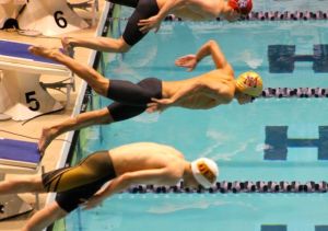 Noah Deiparine takes off from the start of the state finals 200 freestyle relay race on Saturday