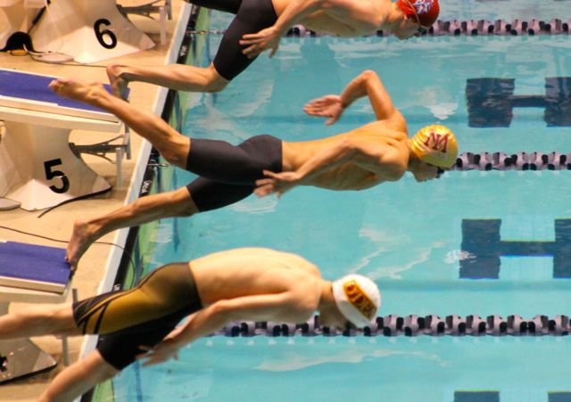Noah Deiparine takes off from the start of the state finals 200 freestyle relay race on Saturday