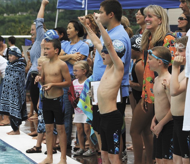A Mercerwood Shore Club Midlakes team member celebrates a win during the MSC versus the Mercer Island Beach Club meet last Thursday.