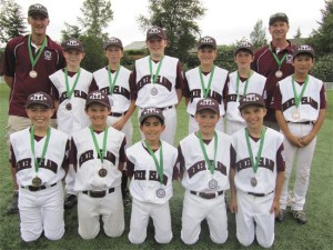 The Mercer Island 11U Little League All Stars include: Coach Brad Myers