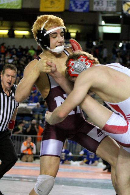 MIHS's Luke Wilson wrestles in the first round of the 3A state Mat Classic on Friday