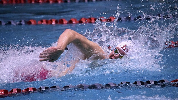 Ian Caldwell swims during the 400 freestyle relay final Saturday