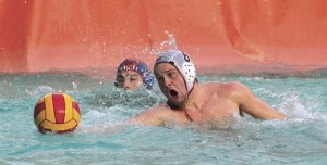 Mercer Island's Sam Peterson reaches for the ball shortly before scoring a goal during the Islanders win over Newport on Wednesday