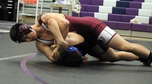 Mercer Island’s Brian Wen pins Lake Washington’s Marshall Baccari in 1:44 during the Islanders’ double dual against Lake Washington and Sammamish Thursday