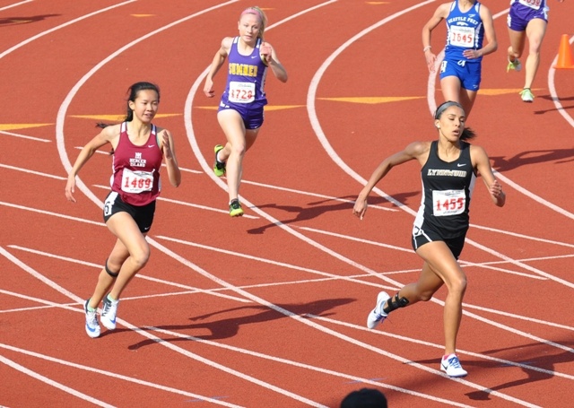 Mercer Island's Kayla Lee (far left) competes in the 3A 400 meter dash preliminaries Friday at Mount Tahoma High School in Tacoma.