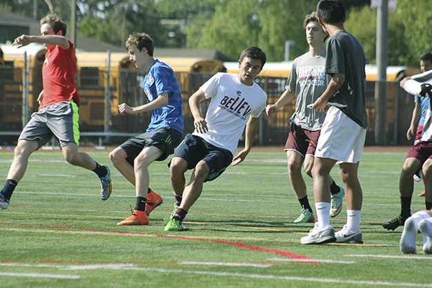 Members of the Mercer Island soccer team take part in sprint drills during practice Friday