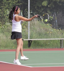 Mercer Island senior Sophia Gage hits the ball during the Islanders home win over Liberty on Wednesday