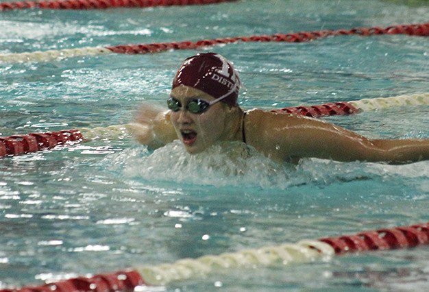Sabrina Kwan swims the 100 fly during the Sea-King 3A district swimming championships Saturday at Mary Wayte Pool.