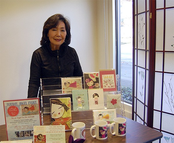 Kay Hirai poses with her handmade artwork to promote “Keiko’s Journey