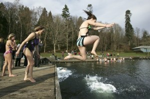 Polar Bear swimmers hit 50-degree Lake Washington at noon on Sunday