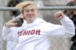 Islander Olivia Harvy won the shotput against Sammamish on Thursday.