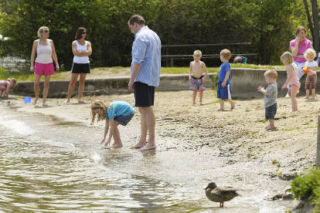 Island children play in the sand at Luther Burbank Park in near-record temperatures last Friday. The parks levy stakeholders group has set forth a wide range of plans to invest in Island parks