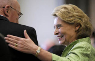Washington state Governor Chris Gregoire greets Islander Bo Darling at an Island Rotary Club meeting last week.