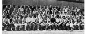 Seventy-seven members of he first graduating class poses next to Mercer Island High School. The class of 1958 recently celebrated its golden anniversary.