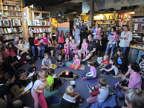 Nancy Stewart far right with guitar