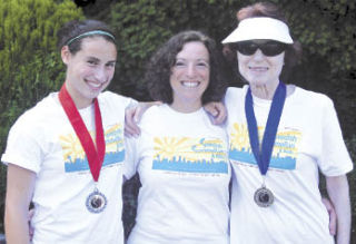 Members of the Lott/Solomon family participated in the Swedish SummeRun for the second year in a row. From left: Celina Solomon finished second in her age division; and her mother