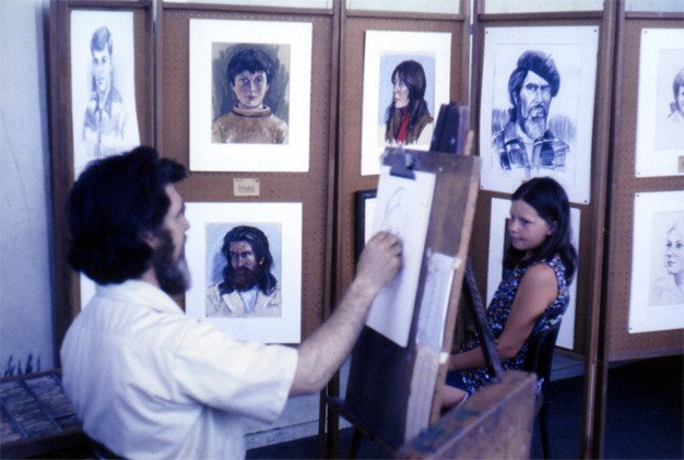 Artist Ren Haugland creates a charcoal portrait of Kelly (Covington) Togesen