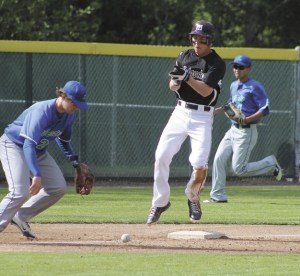 Mercer Island's Nick Holstead celebrates hitting a triple during the first inning of the Mercer Island KingCo tournament game against Liberty on Tuesday. Holstead would go on to score the Islanders first run of the game.