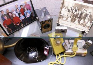 A display for Older Americans Month at the Mercer Island library shows changes in technology over the years.