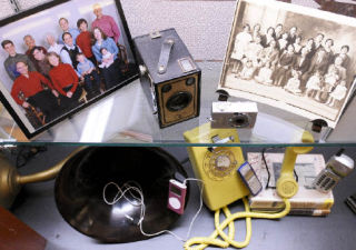 A display for Older Americans Month at the Mercer Island library shows changes in technology over the years.