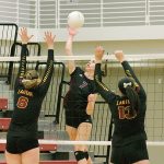 Mercer Island&rsquo;s Kelly Behrbaum (7) goes up for the spike against Lakeside during the Sea-King 3A district tournament final Saturday night at Lakeside High School. The Lions beat the Islanders 25-16, 12-25, 25-17, 25-11. Joe Livarchik/staff photo.