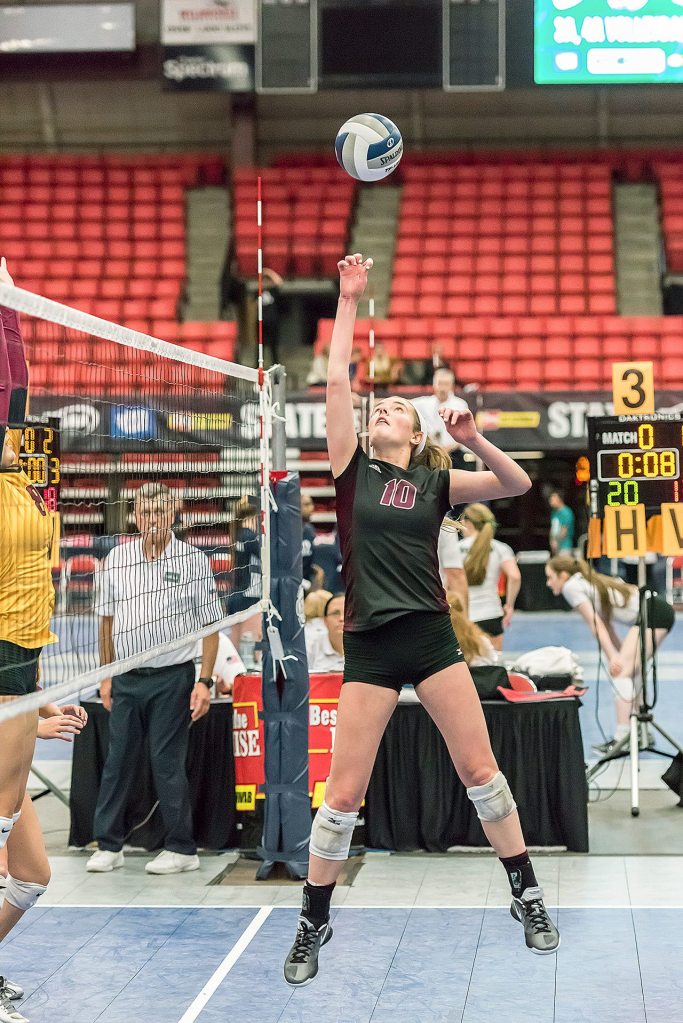 Natalie Robinson sets up for a kill shot for the Islanders. Photo courtesy of John Fisk.
